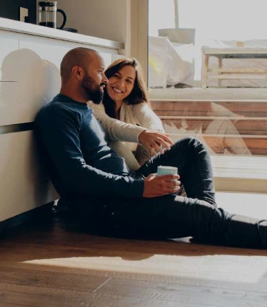 New renters, happy in their home after finding a home without a high-risk from rental listing scams.